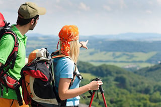 young-backpack-couple-with-hiking-poles.jpg