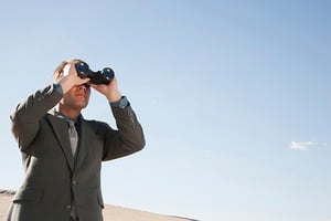 businessman-with-binoculars__low